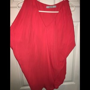 Dark coral colored top.